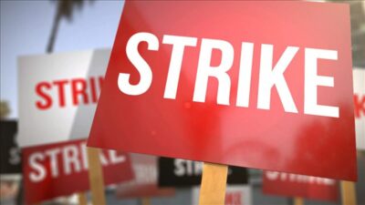 Signs with the words strike across them.